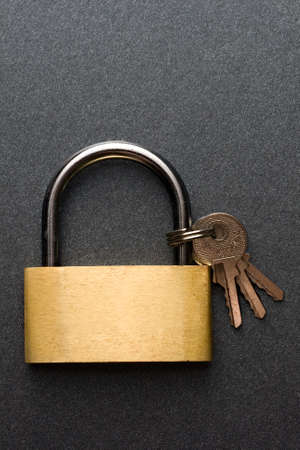 Lock with keys on the grey backgroundの写真素材