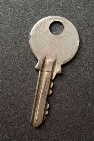 Key on the grey backgroundの写真素材