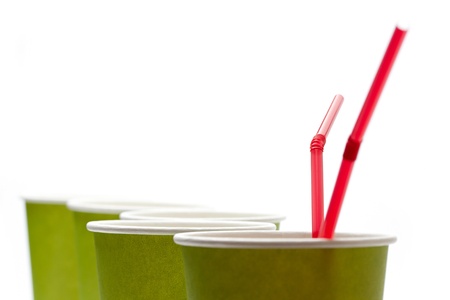 Paper cups with straws on a white backgroundの写真素材