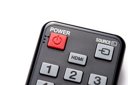 Red Power button on the black remote control
