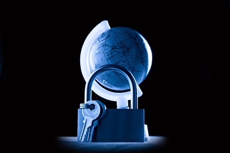 Globe and the keylock in blueの写真素材
