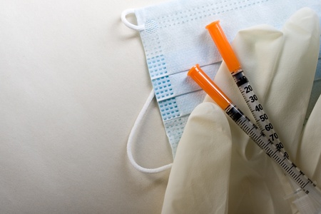 Surgical glove, mask and syringeの写真素材