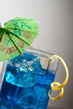 Blue curacao cocktail with decorationの写真素材