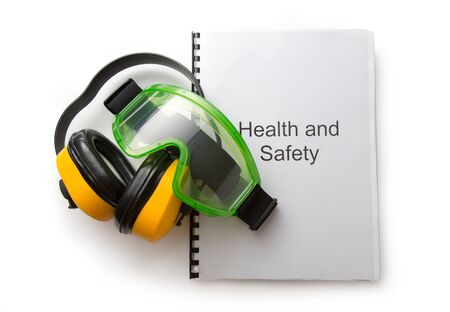 Health and safety register with goggles and earphonesの写真素材