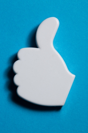 Thumb up okay sign badge