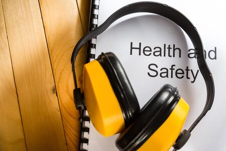 Health and safety register with earphonesの写真素材