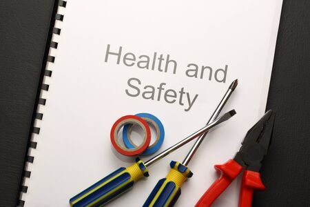 Register with pliers and screwdriversの写真素材