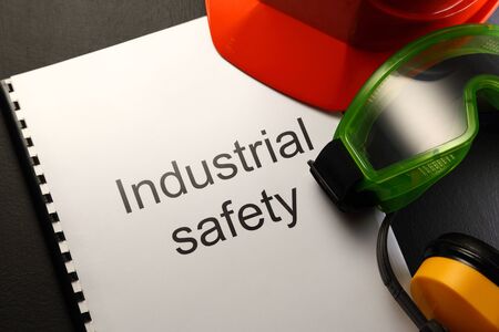 Manual with helmet, goggles and headphonesの写真素材