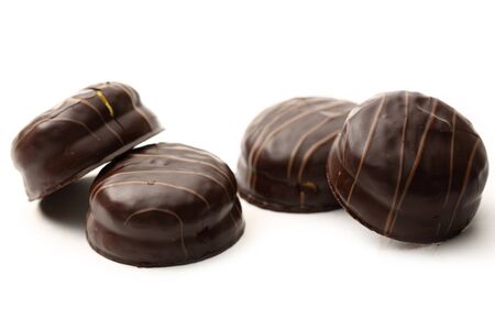 Round chocolate biscuits on whiteの写真素材