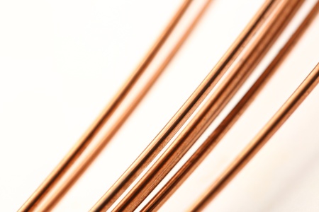 Uncoated wire strings on whiteの写真素材