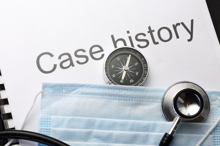 Case history, stethoscope, compass and maskの写真素材