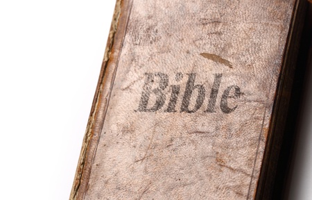 Old Bible book on white backgroundの写真素材