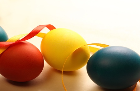 Easter eggs with yellow ribbonの写真素材