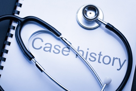Case history and stethoscope on blackの写真素材