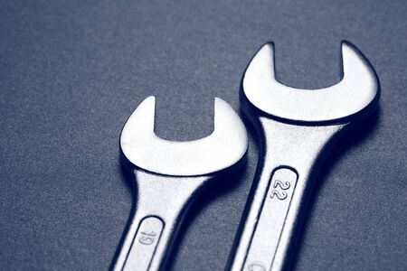 Screw keys on black background の写真素材