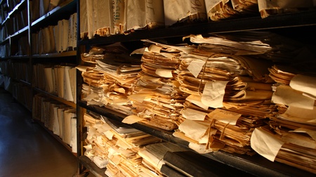 Paper documents stacked in archiveの写真素材
