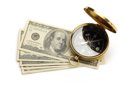 Golden vintage compass and dollarsの写真素材