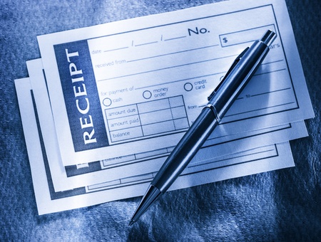 Blank receipt and pen