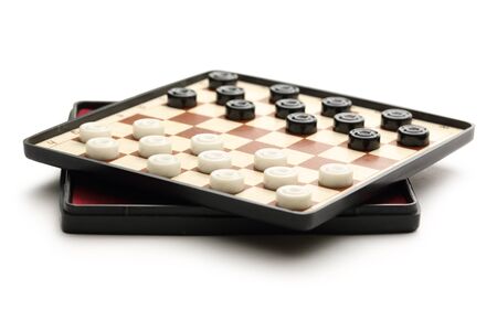 Travelling draughts on playing field の写真素材