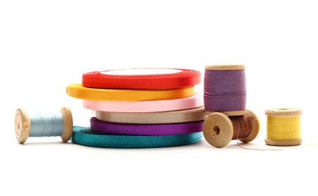 Thread bobbins and reels of ribbon