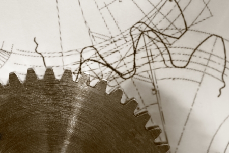 Steel cogwheel on drawingの写真素材