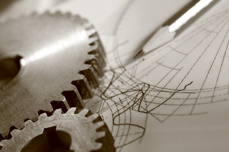 Steel cogwheels in connection on drawingの写真素材