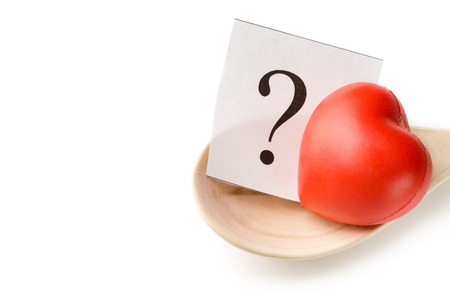 Spoon and heart on whiteの写真素材