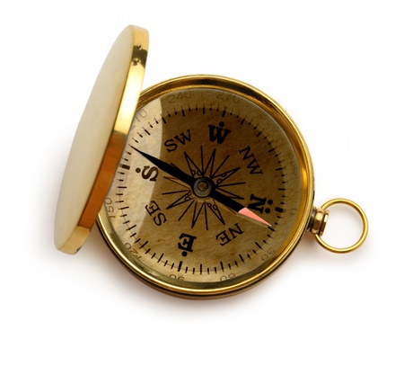Single golden compass on white background の写真素材