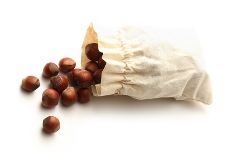 Fresh hazelnuts in a sackの写真素材