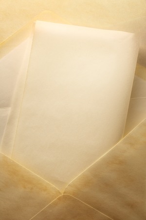 Blank envelope and piece of paperの写真素材