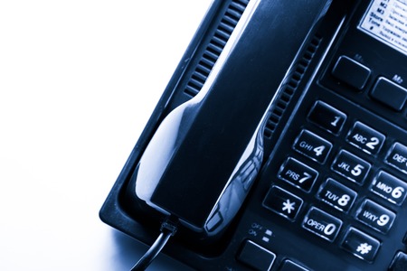 Stationary telephone receiver in closeupの写真素材