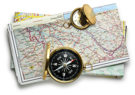 Road map plan and compass on whiteの写真素材