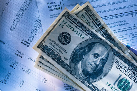 Annual budget, tax form and dollar