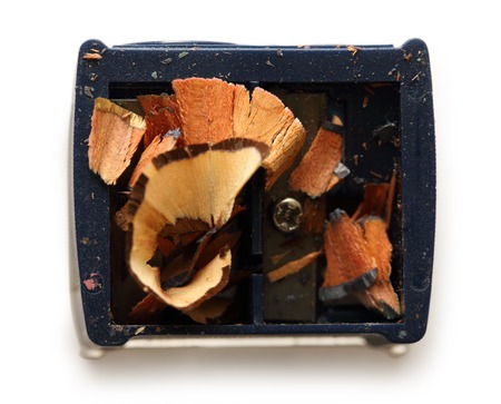 Dirty pencil sharpener on white