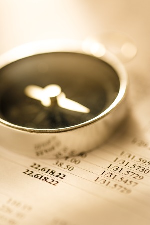 Operating budget and black compass in toningの写真素材