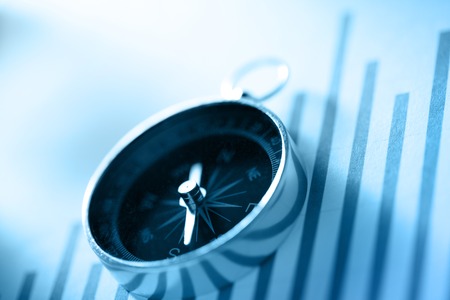 Diagram concept with compass in blue toning