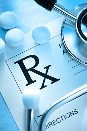 Stethoscope, pills and patient listの写真素材