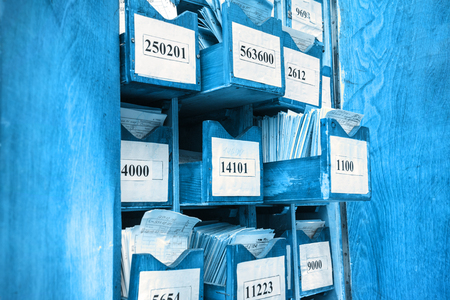 Drawer with business papers organized in archive