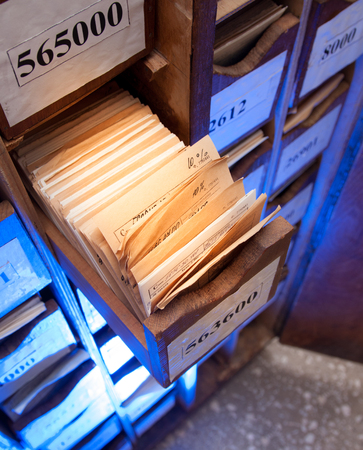 Drawer with business papers organized in archive
