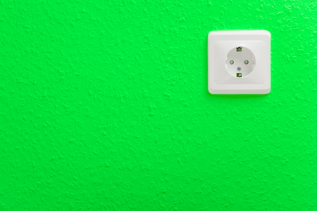 Single electric socket with plug on wallの写真素材