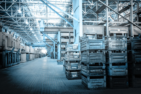 Big storage room with metal boxes in factoryの写真素材