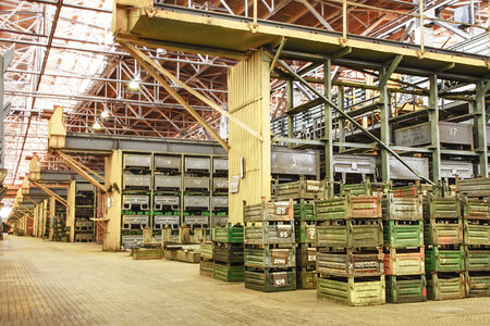 Big storage room with metal boxes in factory