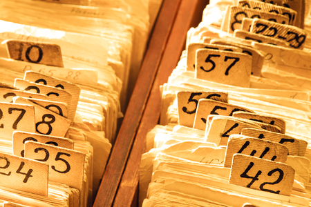 Old cards index catalog with numbers in toningの写真素材