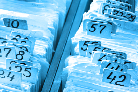 Old cards index catalog with numbers in toningの写真素材