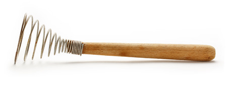 Egg whisk or beater on white backgroundの写真素材