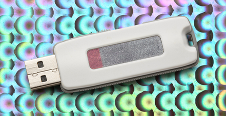 Usb flash drive on the abstract background