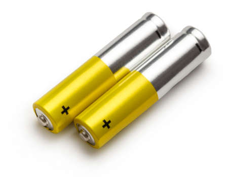 Two batteries with plus sign visible in closeup