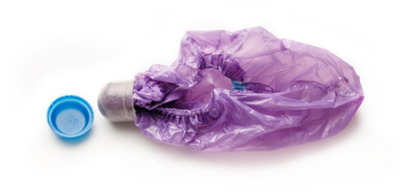 Lilac shoe covers on the white backgroundの写真素材