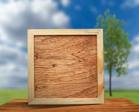 Blank new square wooden frame as backgroundの写真素材