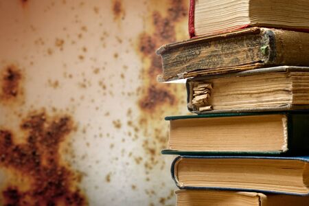 Pile of old used books in closeupの写真素材